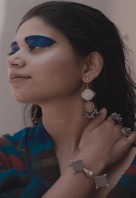 Cosmic Avalanche earring in sterling silver, worn by a model – earrings, Bhavya Ramesh