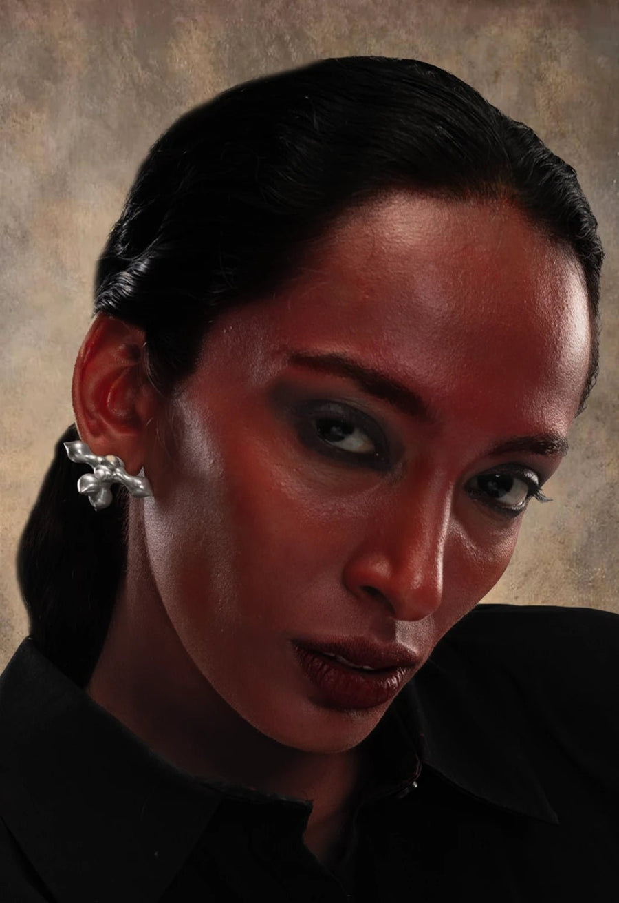 Crucifix earring in 925 sterling silver, worn by a model – earrings, Bhavya Ramesh