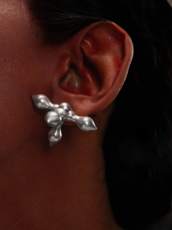 Crucifix earring in 925 sterling silver, worn by a model – earrings, Bhavya Ramesh