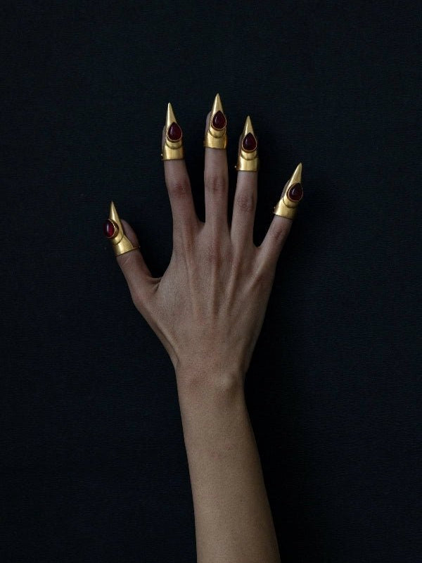 Fangs in 18-carat gold plating on sterling silver, worn by a model – nail rings, Bhavya Ramesh