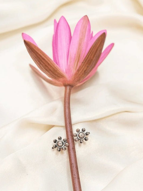 Flower Ear Clip in 925 sterling silver, worn by a model – ear clips, Bhavya Ramesh