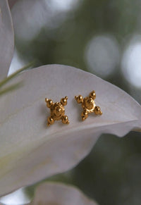 Boucle d'oreille quatre coins