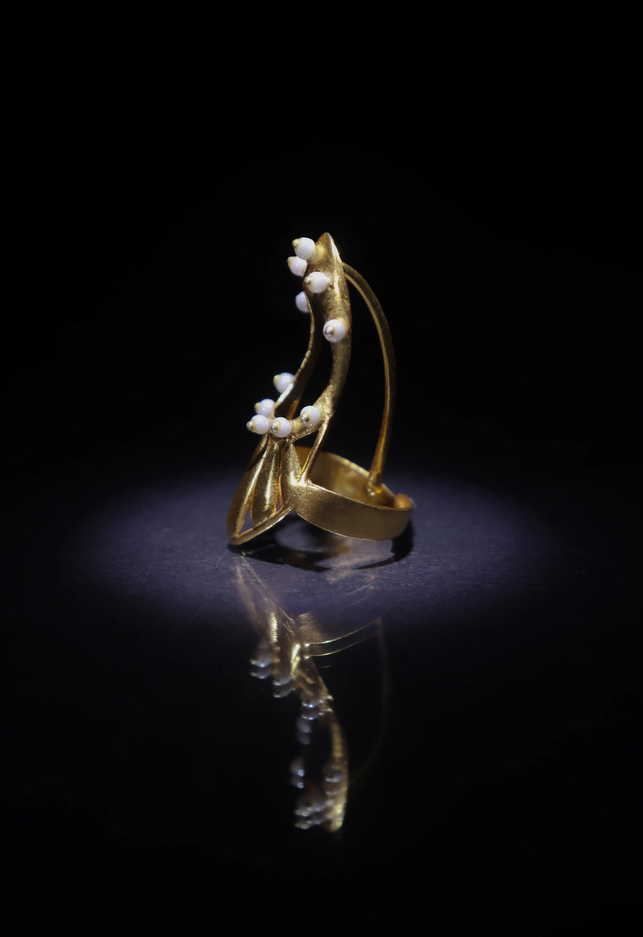 Hansa in 18-carat gold plating on sterling silver, product photo on black – nail rings, Bhavya Ramesh