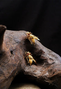 Boucles d'oreilles mouche maison