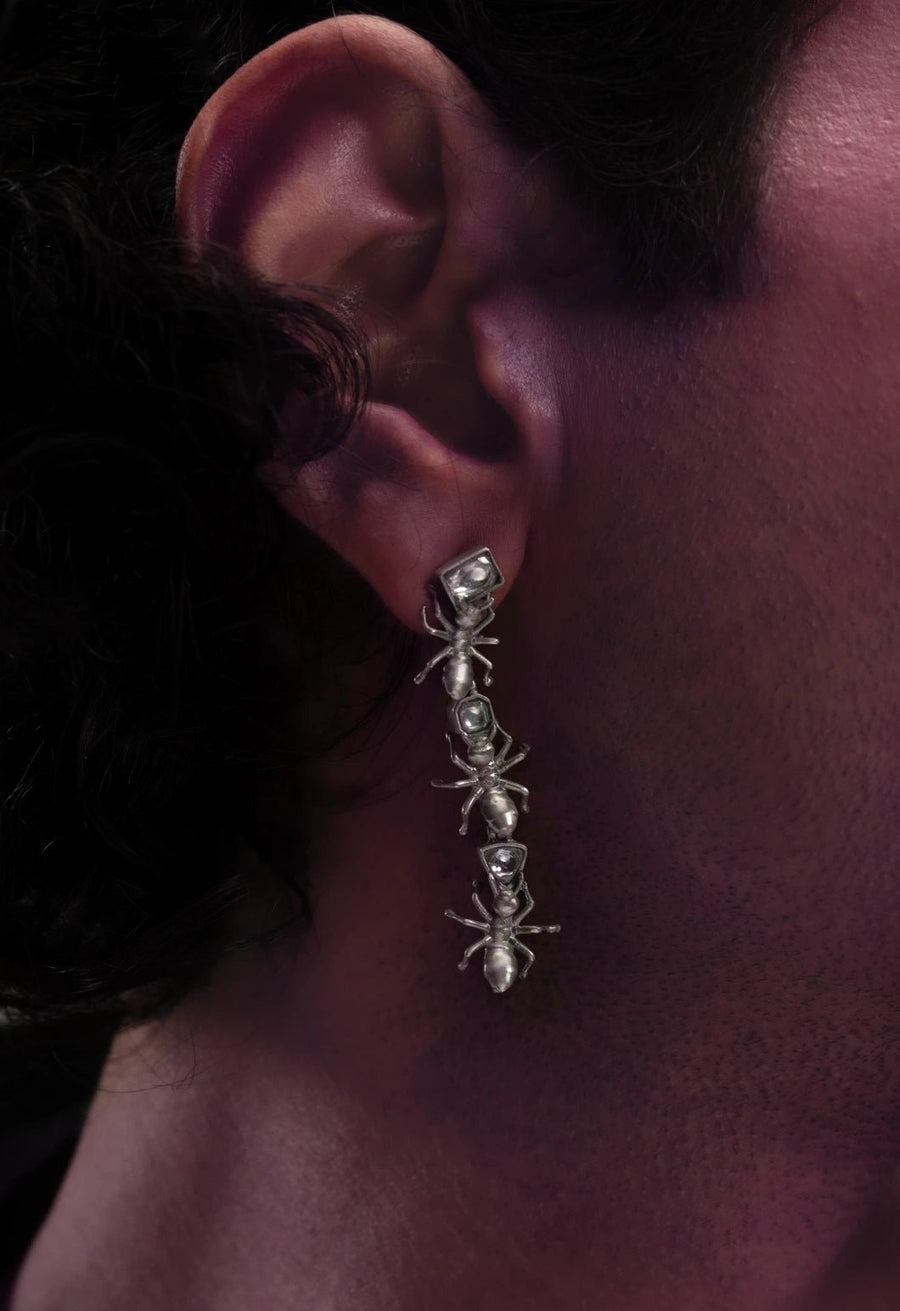 Insidious Earring in 925 sterling silver, product photo on black – earrings, Bhavya Ramesh