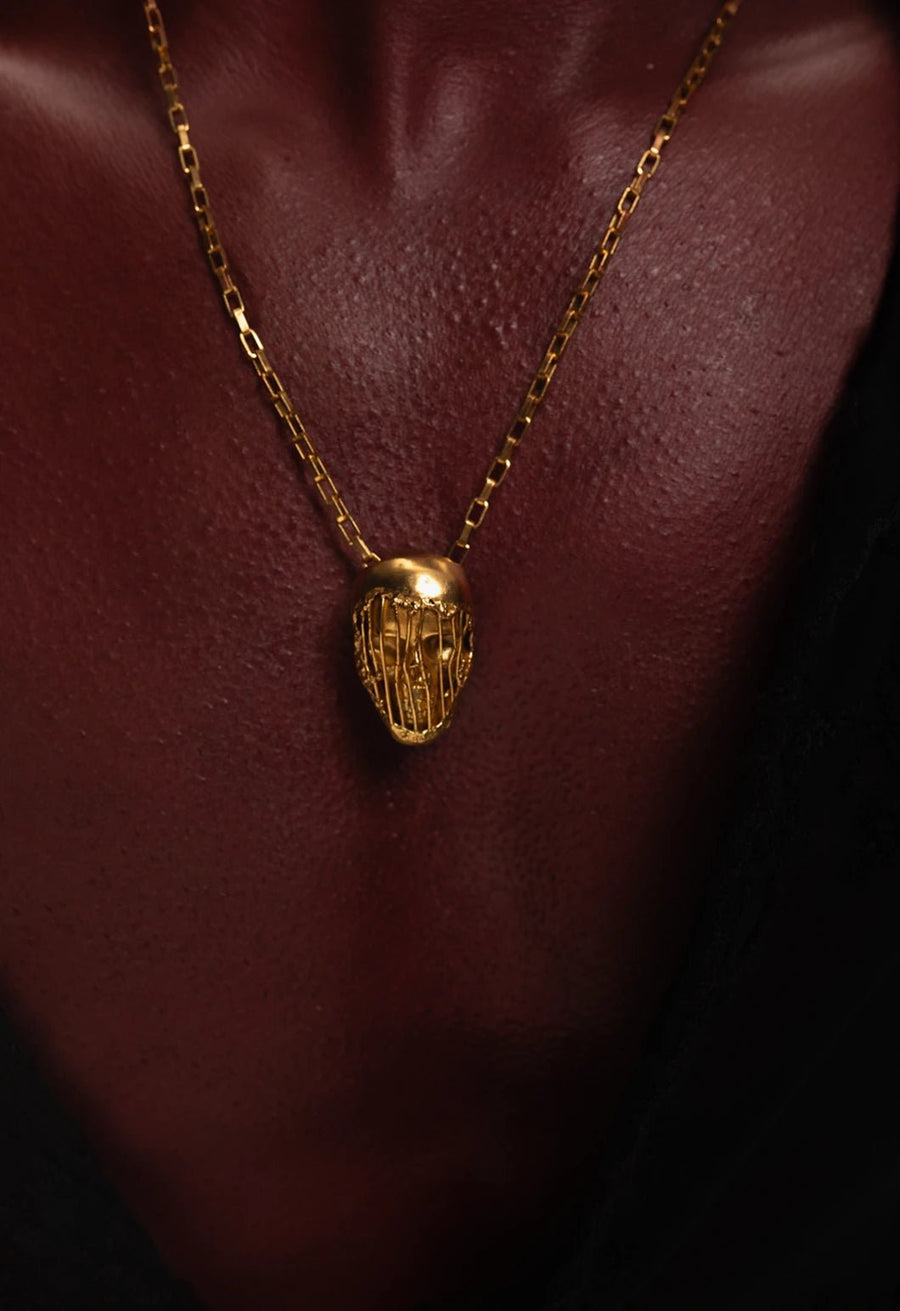 Iron grip neck piece in 18-carat gold plating on sterling silver, product photo on black – neck pieces, Bhavya Ramesh