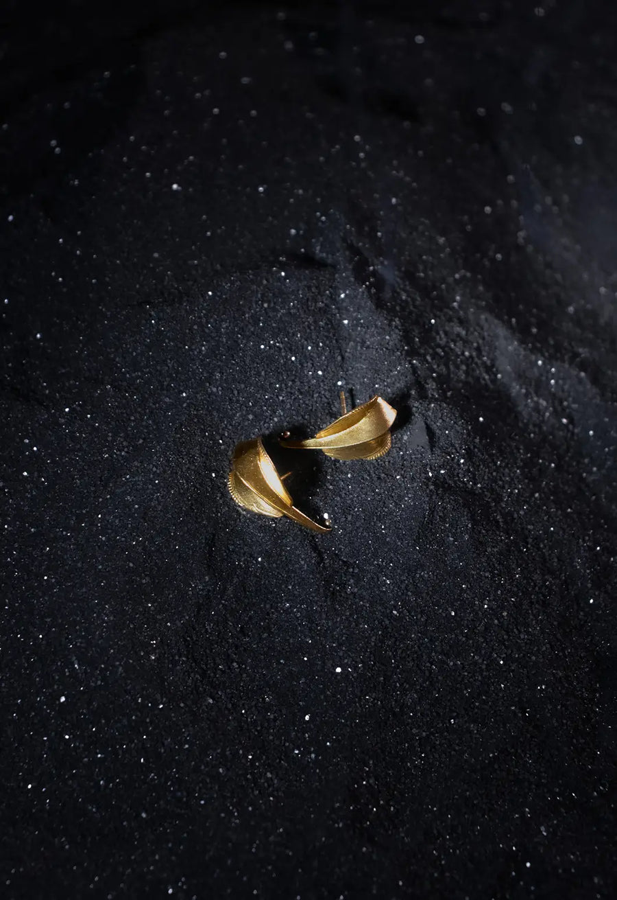 Kadru Earring in 18-carat gold plating on sterling silver, product photo on black – earrings, Bhavya Ramesh