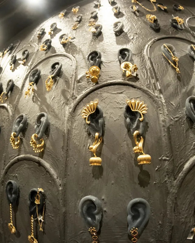 The wall of ears, each one wearing a Bhavya Ramesh earring
