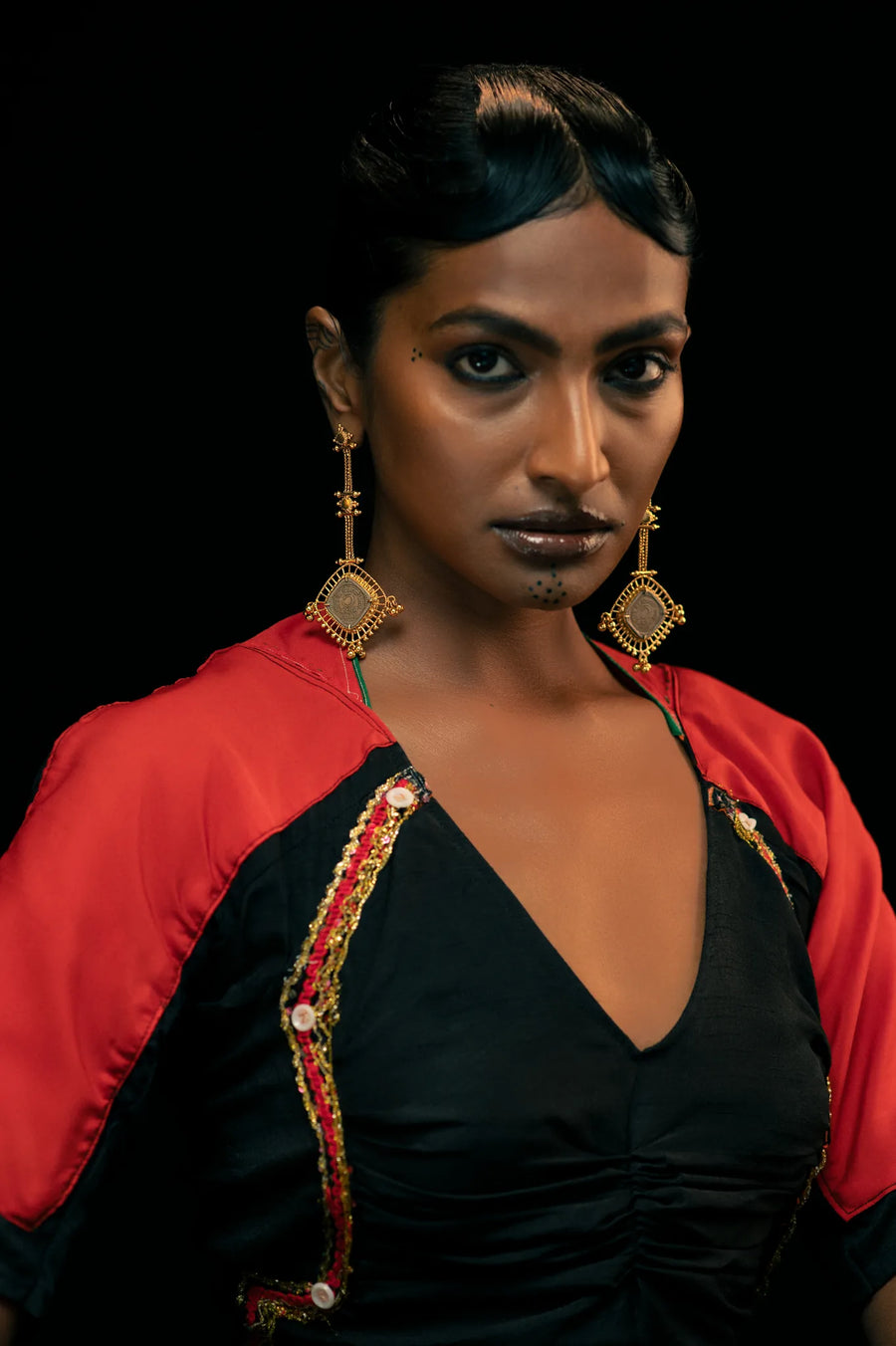 Kite Earrings in 18-carat gold plating on sterling silver, worn by a model – earrings, Bhavya Ramesh