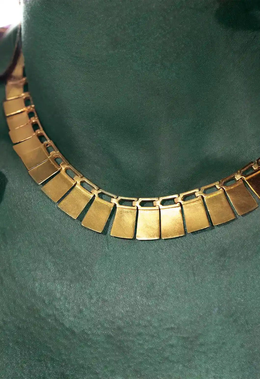 LustreLine in 18-carat gold plating on sterling silver, product photo on black – neck pieces, Bhavya Ramesh