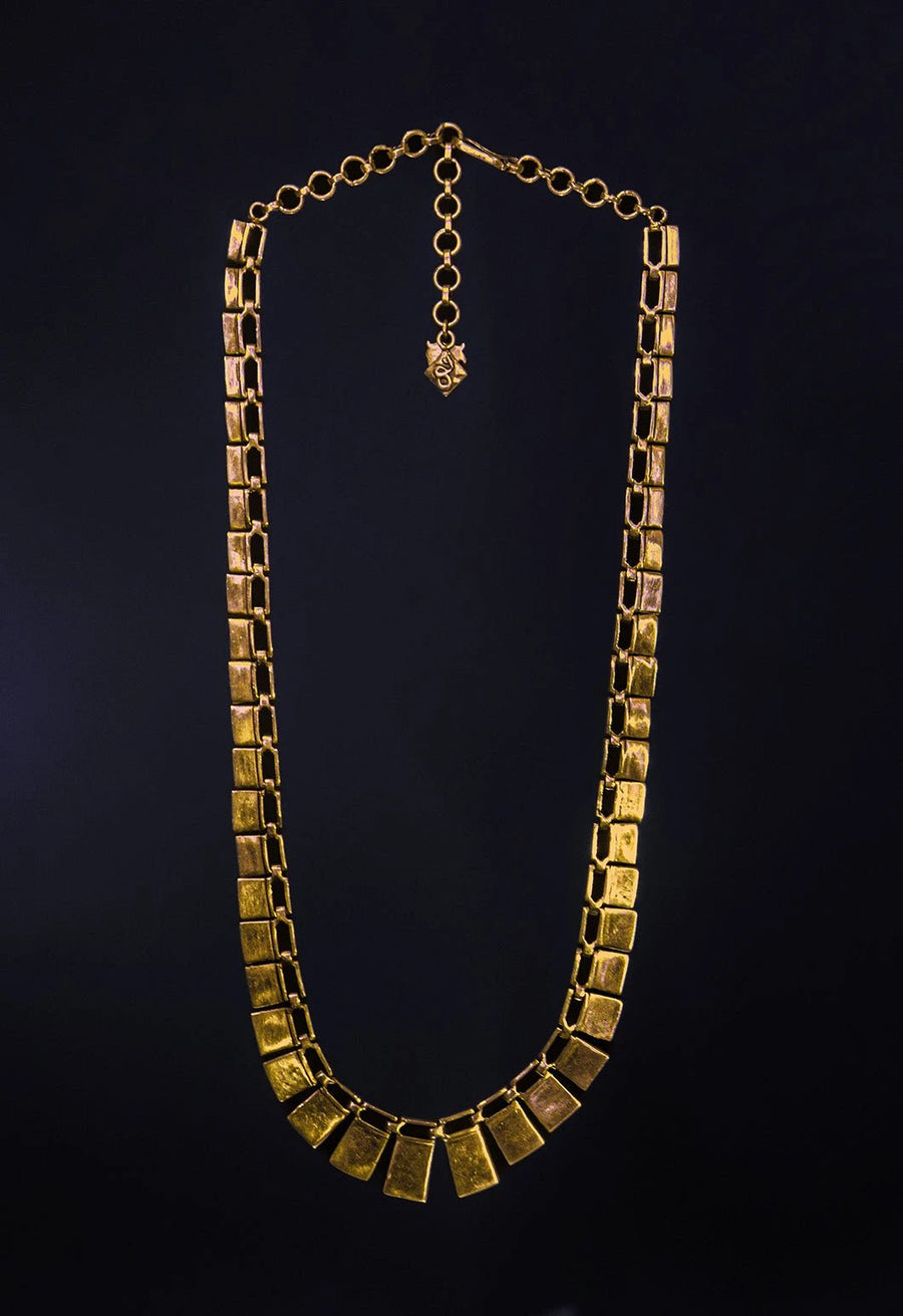 LustreLine in 18-carat gold plating on sterling silver, product photo on black – neck pieces, Bhavya Ramesh
