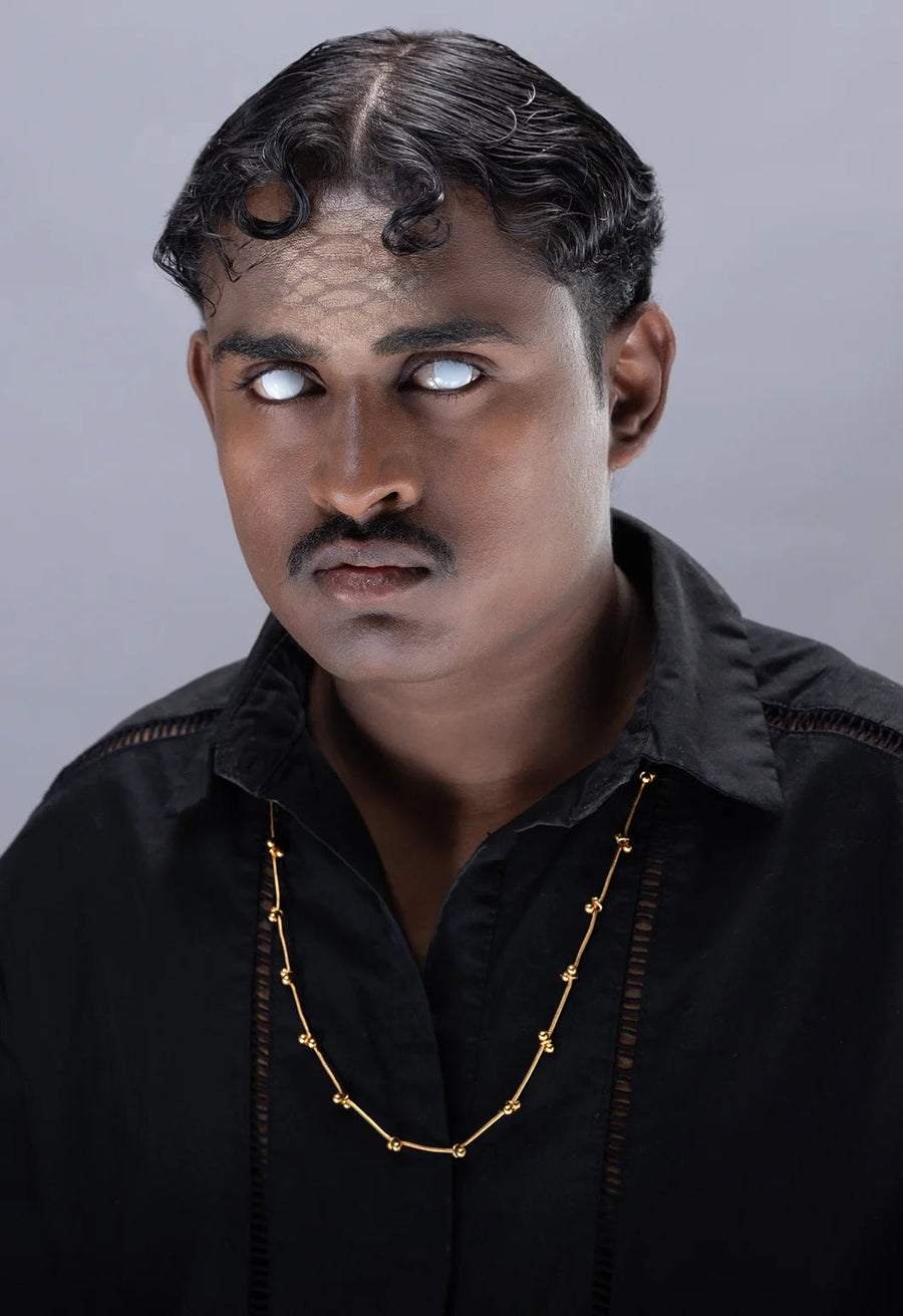 Mankashi Neckpiece in 18-carat gold plating on sterling silver, worn by a model – neck pieces, Bhavya Ramesh