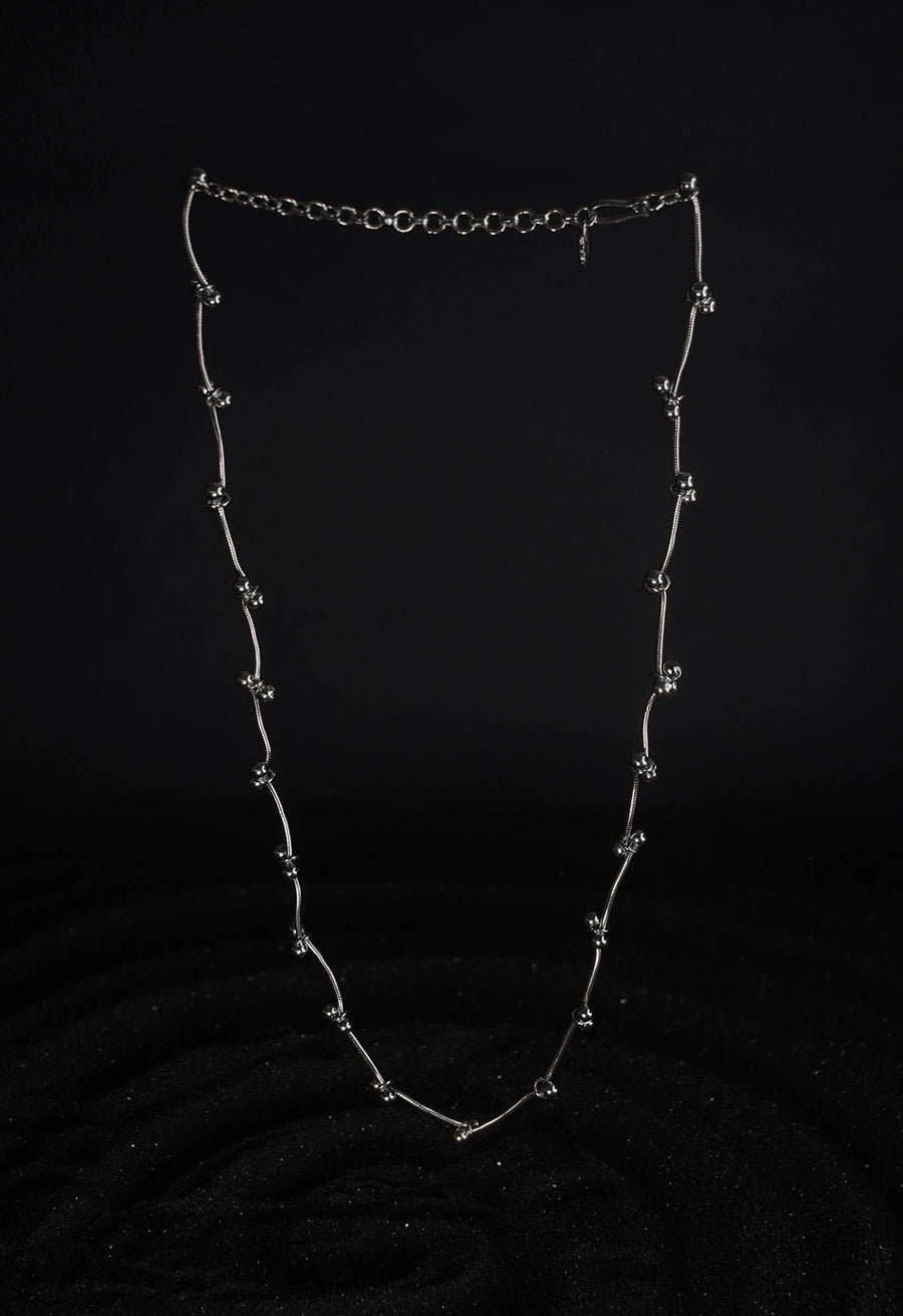 Mankashi Neckpiece in 925 sterling silver, product photo on black – neck pieces, Bhavya Ramesh
