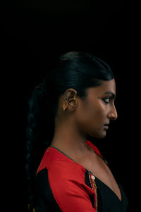 Murmur Ear Clip in 18-carat gold plating on sterling silver, worn by a model – ear clips, Bhavya Ramesh