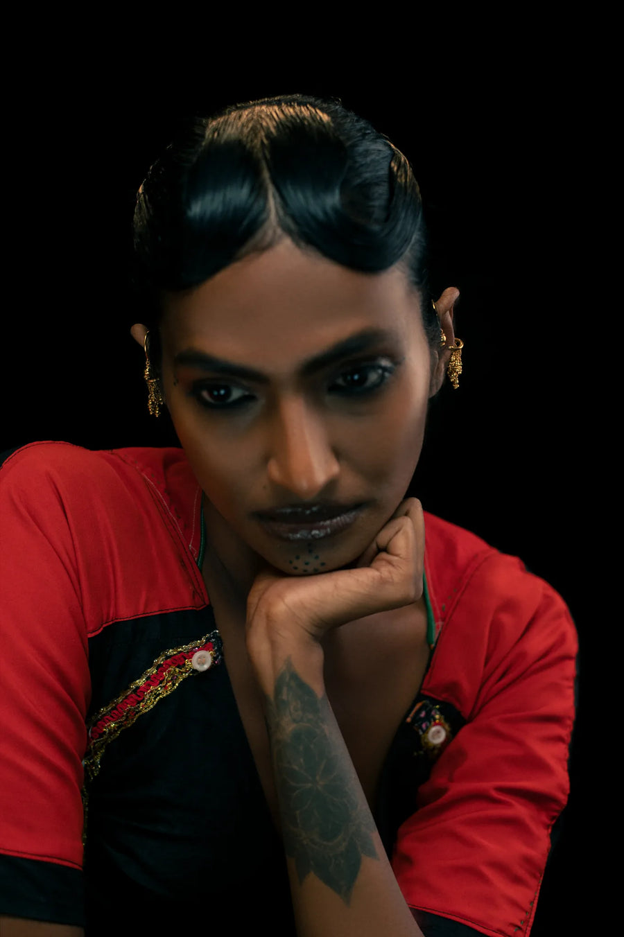 Murmur Ear Clip in 18-carat gold plating on sterling silver, worn by a model – ear clips, Bhavya Ramesh