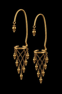 Murmur Ear Clip in 18-carat gold plating on sterling silver, product photo on black – ear clips, Bhavya Ramesh