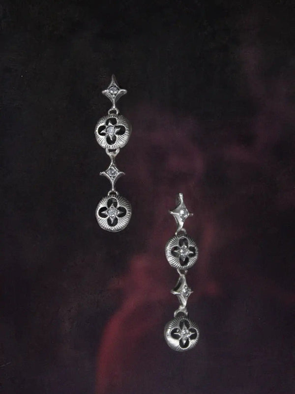 Oblivion Earring in 925 sterling silver, product photo on black – earrings, Bhavya Ramesh