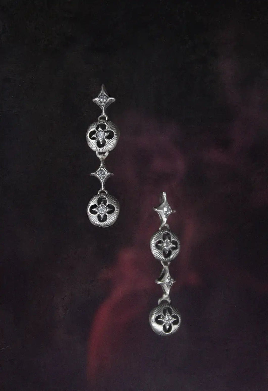 Oblivion Earring in 925 sterling silver, product photo on black – earrings, Bhavya Ramesh
