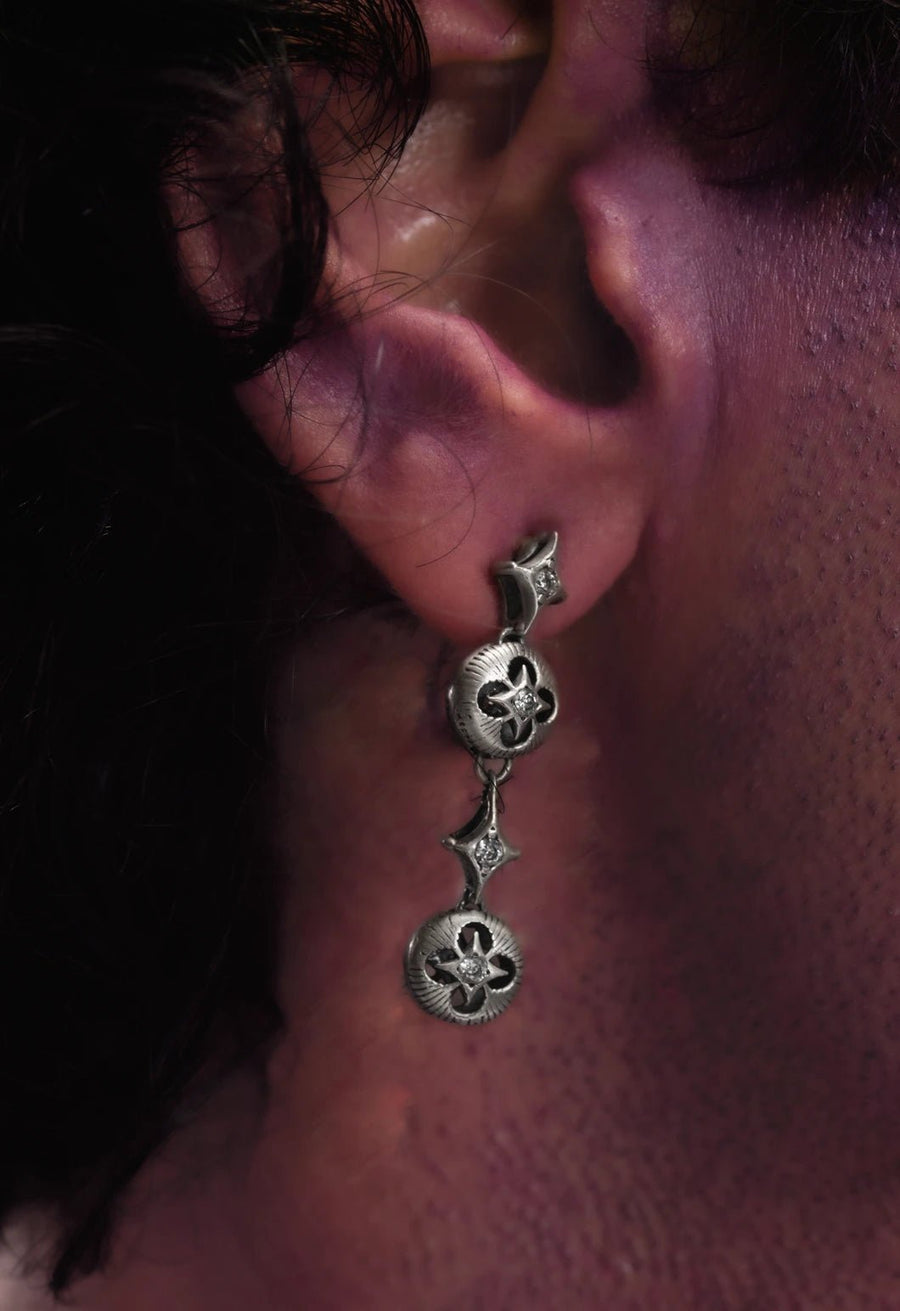 Oblivion Earring in 925 sterling silver, product photo on black – earrings, Bhavya Ramesh