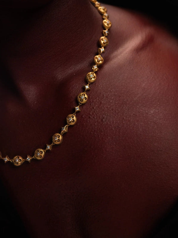 Oblivion Neckpiece in 18-carat gold plating on sterling silver, worn by a model – neck pieces, Bhavya Ramesh