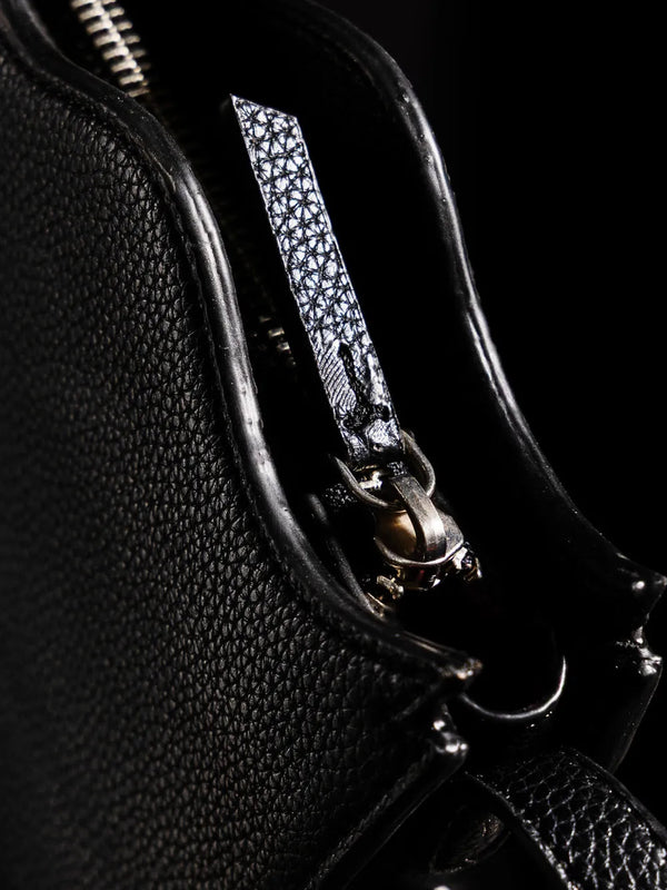 Keeper Bag in sterling silver, product photo on black – handbag, Bhavya Ramesh