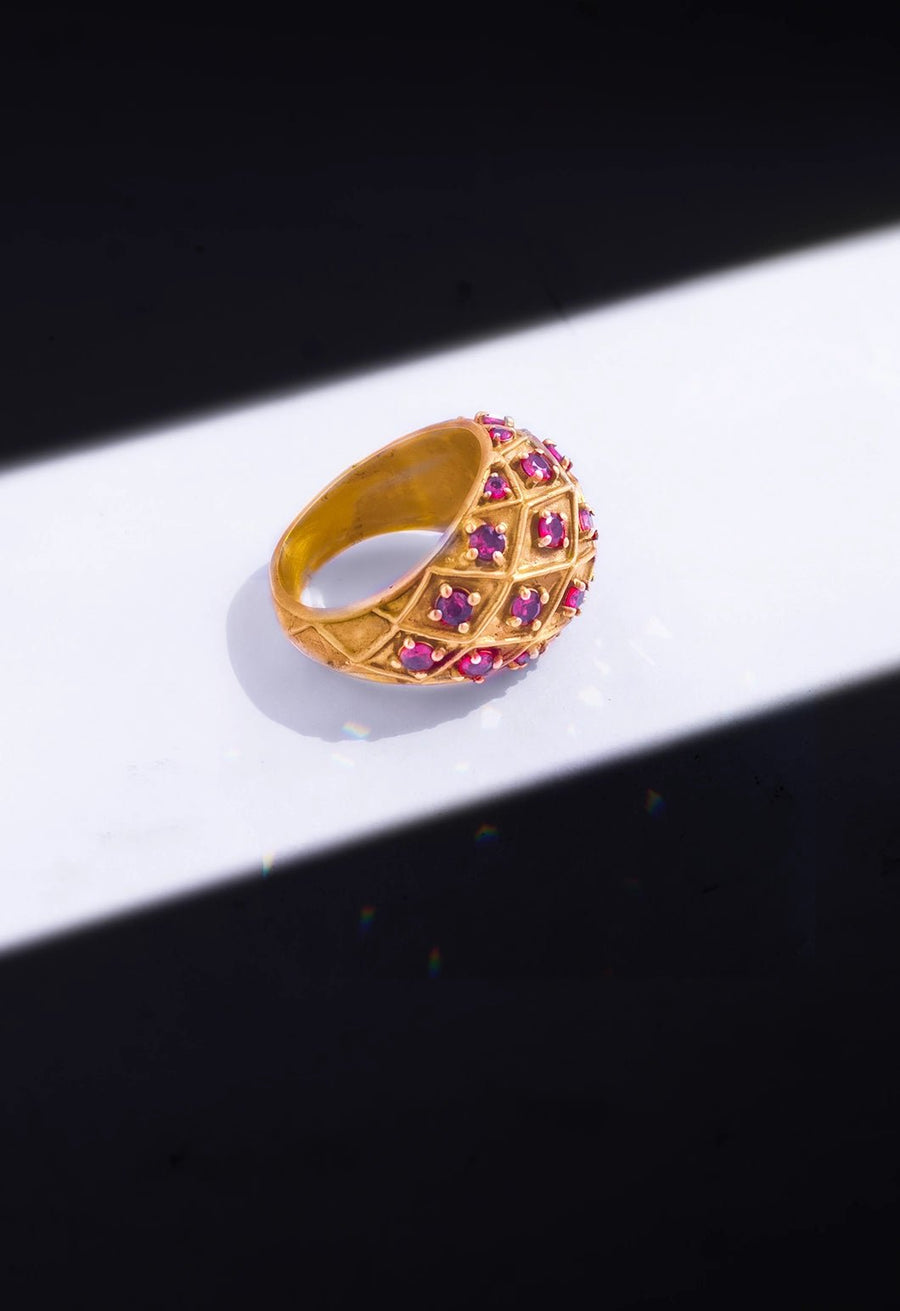 Sarmani Ring in 18-carat gold plating on sterling silver, product photo on black – rings, Bhavya Ramesh