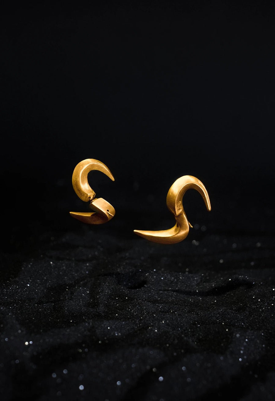 Serpa Earring in 18-carat gold plating on sterling silver, product photo on black – earrings, Bhavya Ramesh