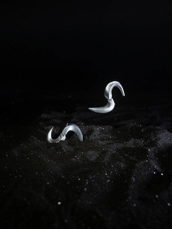 Serpa Earring in 925 sterling silver, product photo on black – earrings, Bhavya Ramesh
