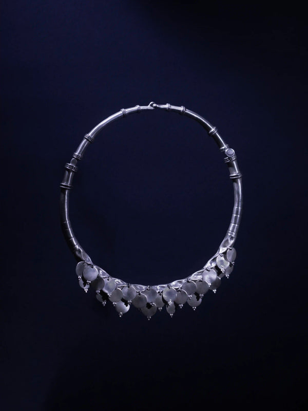 ShimmerShield in 925 sterling silver, product photo on black – neck pieces, Bhavya Ramesh