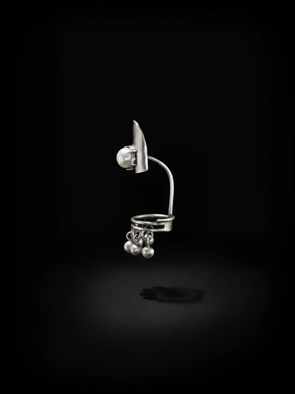 Pearlita in sterling silver, product photo on black – nail rings, Bhavya Ramesh