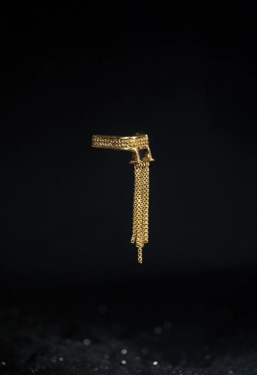 Slinther Ear clips in 18-carat gold plating on sterling silver, product photo on black – ear clips, Bhavya Ramesh