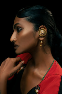 Sundial Earrings in 18-carat gold plating on sterling silver, worn by a model – earrings, Bhavya Ramesh