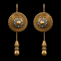 Sundial Earrings in 18-carat gold plating on sterling silver, product photo on black – earrings, Bhavya Ramesh
