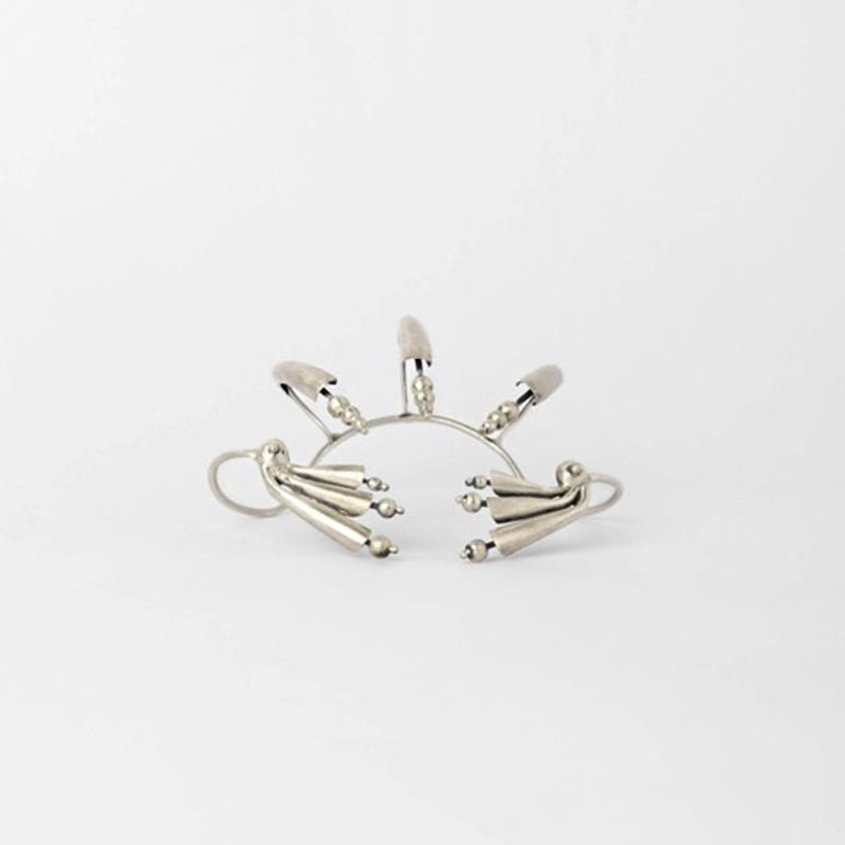 The Predator Palm Cuff in 925 sterling silver, product photo on black – palm cuff, Bhavya Ramesh