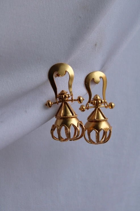Trishul Jhumka in 18-carat gold plating on sterling silver, product photo on black – earrings, Bhavya Ramesh