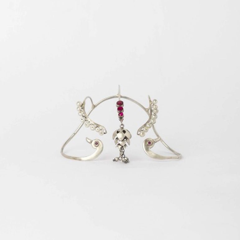 Twin Flames Palm Cuff in 925 sterling silver, product photo on black – palm cuff, Bhavya Ramesh