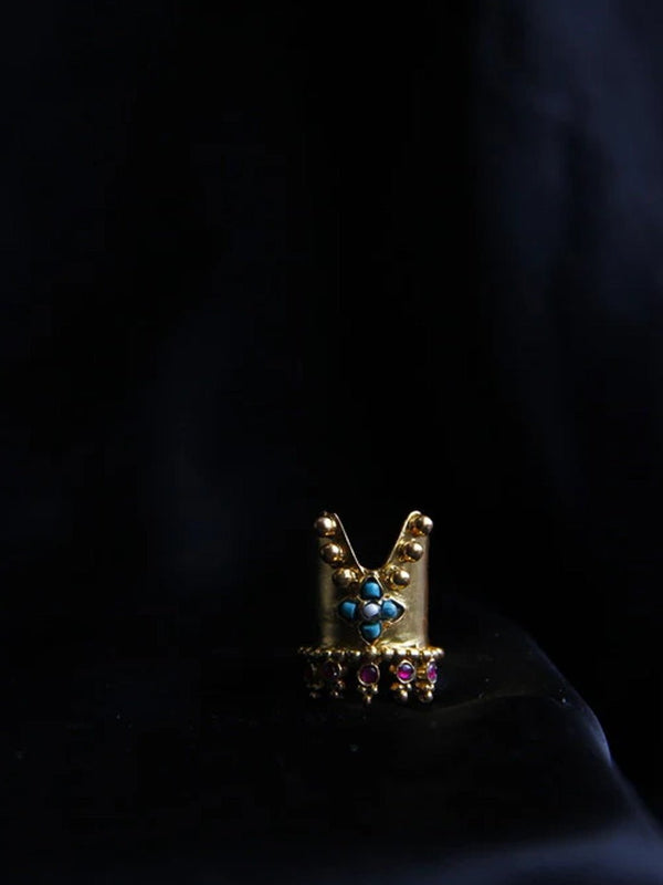 Unicorn Nail Ring in 18-carat gold plating on sterling silver, product photo on black – nail rings, Bhavya Ramesh