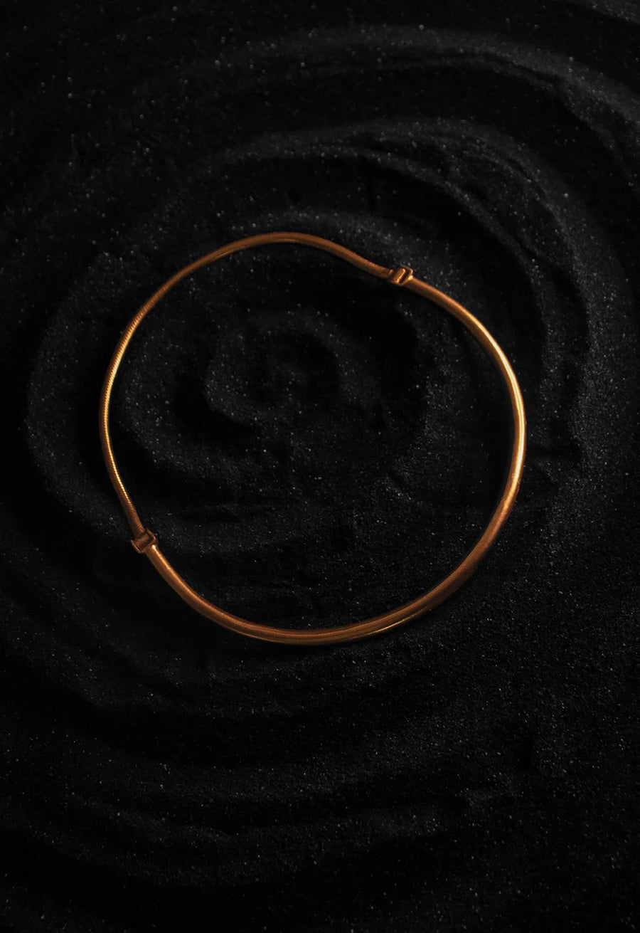 Vishrantha Neckpiece in 18-carat gold plating on sterling silver, product photo on black – neck pieces, Bhavya Ramesh
