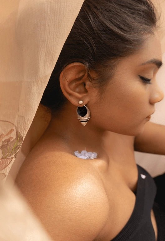 Warrior Of Light Ear Shields in 925 sterling silver, worn by a model – earrings, Bhavya Ramesh