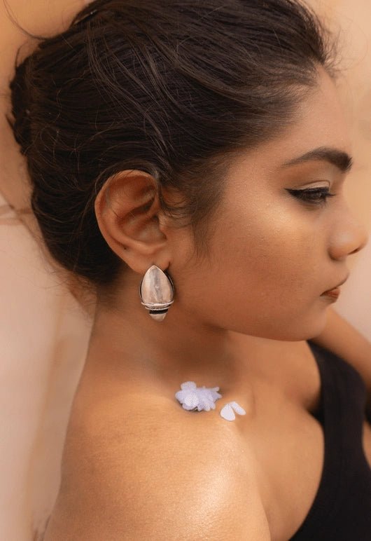 Warrior Of Light Ear Shields in 925 sterling silver, worn by a model – earrings, Bhavya Ramesh