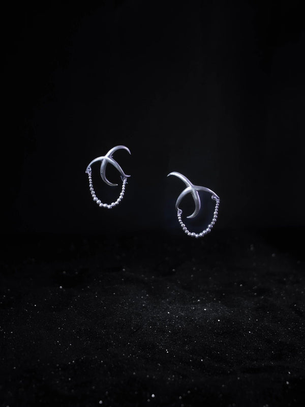 Zohrath Earring in 925 sterling silver, product photo on black – earrings, Bhavya Ramesh